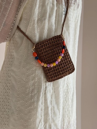 Brown Raffia Crossbody Bag...